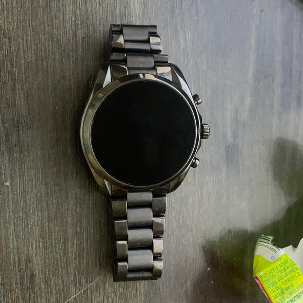 This is a Sam’ssung touch screen Michael Kora Watch